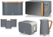 A set of kitchen appliances including a 1.7L jug kettle, a 2 slice toaster, an 800W 20L digital microwave, a bread bin and canisters, all in grey color with wood effect accents.