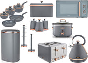 A collection of kitchen appliances and storage items in grey and rose gold, including a kettle, toaster, microwave, slow cooker, canisters, mug tree, towel pole, and sensor bin.