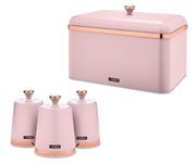 A set of kitchen storage canisters and a bread bin, all in a matte pink finish with rose gold accents.