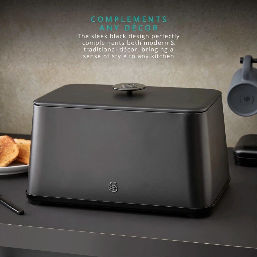 The Hale Retail Company Swan Stealth black iron bread bin with a sleek matte finish on a modern kitchen countertop.